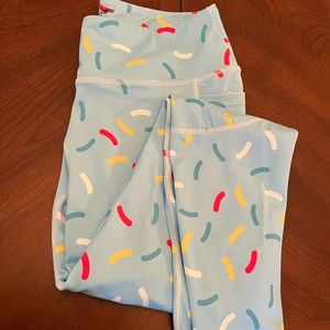 Feed Me Fight Me donut sprinkle leggings (M)